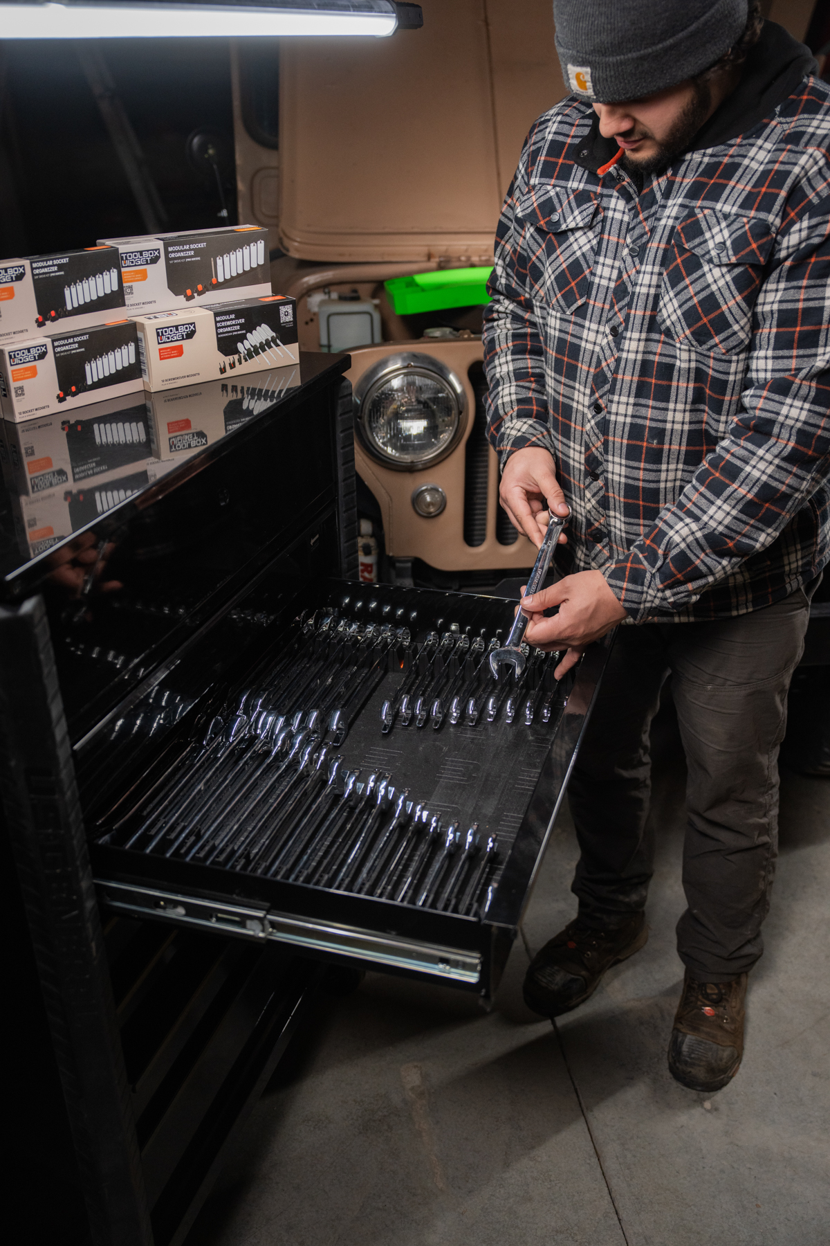 Mechanic reaching into a well-organized drawer with Toolbox Widget organizers — after transformation